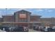 King Soopers grocery and drug store with parking lot and cars at 4543 Cathay St, Denver, CO 80249