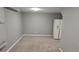 Room with neutral carpet and a white refrigerator at 4543 Cathay St, Denver, CO 80249