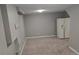Room with neutral carpet and a white refrigerator at 4543 Cathay St, Denver, CO 80249