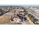 Aerial view showcasing townhomes near a busy road at 8865 Federal Blvd # 202, Westminster, CO 80260