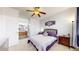 Bright bedroom with a queen-size bed and en-suite bathroom at 8865 Federal Blvd # 202, Westminster, CO 80260
