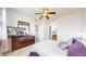 Main bedroom with a dresser, ceiling fan, and en-suite bathroom at 8865 Federal Blvd # 202, Westminster, CO 80260