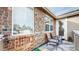 Brick patio with two chairs and small rug at 8865 Federal Blvd # 202, Westminster, CO 80260