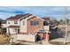 Brick townhouse with a private entrance and attached garage at 8865 Federal Blvd # 202, Westminster, CO 80260