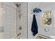 Bathroom with shower/tub combo and subway tile at 7893 Hill Crest Dr, Louviers, CO 80131