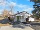 Charming single story home with a freshly painted exterior and a well-maintained front yard at 5505 Brentwood St, Arvada, CO 80002