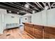 Open basement area featuring a bar and seating at 2286 S Pitkin Way # A, Aurora, CO 80013