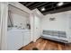 Bright laundry room area in basement with washer, dryer, and laundry sink at 2286 S Pitkin Way # A, Aurora, CO 80013