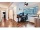 Home office space with natural light and ceiling fan near a stairway and closet at 2286 S Pitkin Way # A, Aurora, CO 80013
