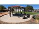 Community area featuring a gazebo with picnic tables and a grill for summer cookouts at 10150 E Virginia Ave # 308, Denver, CO 80247