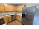 The updated kitchen features stainless steel appliances, modern cabinets, and sleek countertops at 10150 E Virginia Ave # 308, Denver, CO 80247