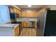 The updated kitchen features stainless steel appliances, modern cabinets, and sleek countertops at 10150 E Virginia Ave # 308, Denver, CO 80247