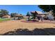 Exterior view of a playground with play structures and a gazebo in the community at 10150 E Virginia Ave # 308, Denver, CO 80247
