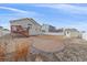 Brick patio and grassy yard with storage shed at 2420 Nicholson St, Berthoud, CO 80513