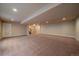 Finished basement with carpet, recessed lighting, and access to stairs at 2420 Nicholson St, Berthoud, CO 80513