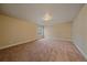 Finished basement room with window, neutral walls, and carpet at 2420 Nicholson St, Berthoud, CO 80513