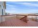 Spacious deck overlooks a large backyard with distant views at 2420 Nicholson St, Berthoud, CO 80513