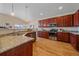 Spacious kitchen featuring granite counters and stainless steel appliances at 2420 Nicholson St, Berthoud, CO 80513