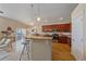 Kitchen with hardwood floors, granite countertop, and stainless steel appliances at 2420 Nicholson St, Berthoud, CO 80513