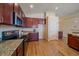 Well-equipped kitchen with granite countertops and ample cabinetry at 2420 Nicholson St, Berthoud, CO 80513