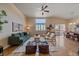 Spacious living room with hardwood floors, large windows, and comfortable seating at 2420 Nicholson St, Berthoud, CO 80513