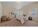 Relaxing main bedroom with plush carpet and large windows at 2420 Nicholson St, Berthoud, CO 80513
