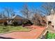 Brick patio, outdoor fireplace, and beautiful yard at 637 N Franklin St, Denver, CO 80218