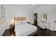 Bright bedroom with white walls, hardwood floors, and modern furnishings at 637 N Franklin St, Denver, CO 80218