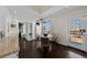 Cozy dining area with built-in cabinets, hardwood floors, and access to the outdoors at 637 N Franklin St, Denver, CO 80218