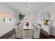 Well lit formal dining room with table that seats eight at 637 N Franklin St, Denver, CO 80218