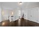 Upper hallway with hardwood floors, white trim, and access to multiple rooms at 637 N Franklin St, Denver, CO 80218
