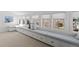 Window seat featuring built in storage, many windows and neutral tones at 637 N Franklin St, Denver, CO 80218