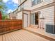 Backyard deck with space for entertaining with sliding glass door access to indoors at 2578 E Nichols Cir, Centennial, CO 80122