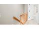 Hallway with a wooden railing at 2578 E Nichols Cir, Centennial, CO 80122