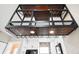 Wine rack above sink and stainless steel appliances at 2578 E Nichols Cir, Centennial, CO 80122