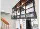 Wine rack above sink and stainless steel appliances at 2578 E Nichols Cir, Centennial, CO 80122