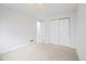 Spacious bedroom with carpet flooring and double door closet at 2090 S Fairplay St, Aurora, CO 80014