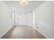A bright bedroom with neutral carpet, a closet, and white walls for a fresh look at 2090 S Fairplay St, Aurora, CO 80014