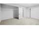 Bedroom featuring neutral carpet, a closet, and white walls, creating a cozy and bright space at 2090 S Fairplay St, Aurora, CO 80014