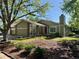 Inviting home featuring a well-manicured front yard and an attached garage at 2090 S Fairplay St, Aurora, CO 80014