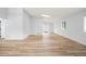 Bright open living area with hard surface floors, plenty of natural light and fresh neutral paint at 2090 S Fairplay St, Aurora, CO 80014