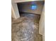 Large basement area with unfinished flooring and natural light from basement window at 3984 S Pitkin Way, Aurora, CO 80013