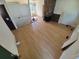 A living room with hardwood floors and a stone fireplace ready to be remodeled at 3984 S Pitkin Way, Aurora, CO 80013