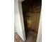 A small storage area or closet featuring exposed framing and shelving at 3984 S Pitkin Way, Aurora, CO 80013