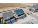 Aerial view of a two-story home with a blue roof in a residential neighborhood at 21821 E 7Th Ave, Aurora, CO 80018
