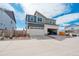 Exterior of a two-story home with an attached two-car garage and driveway at 21821 E 7Th Ave, Aurora, CO 80018