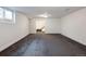 Spacious carpeted basement featuring stairs to the main floor at 30 Eudora St, Denver, CO 80220