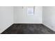 Neutral basement room features a window providing natural light, plus gray carpet at 30 Eudora St, Denver, CO 80220