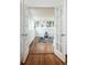 Bright bonus room featuring wood floors, a yoga mat, and plenty of natural light at 30 Eudora St, Denver, CO 80220