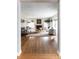 Spacious living room featuring hardwood floors, a fireplace, neutral paint and sophisticated decor at 30 Eudora St, Denver, CO 80220
